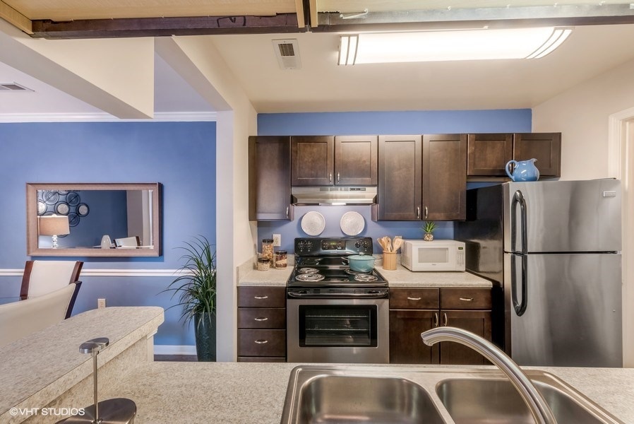 Eat-In Kitchen Table With Sink at Brittany Commons Apartments, Spotsylvania, VA